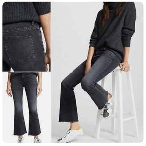 Nili Lotan faded black Vianca flare cropped jeans.